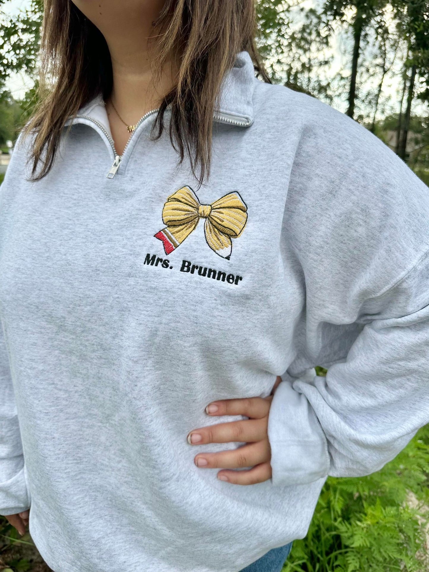 Pencil Bow with Personalized Teacher Name on Quarter Zip Sweater - On model