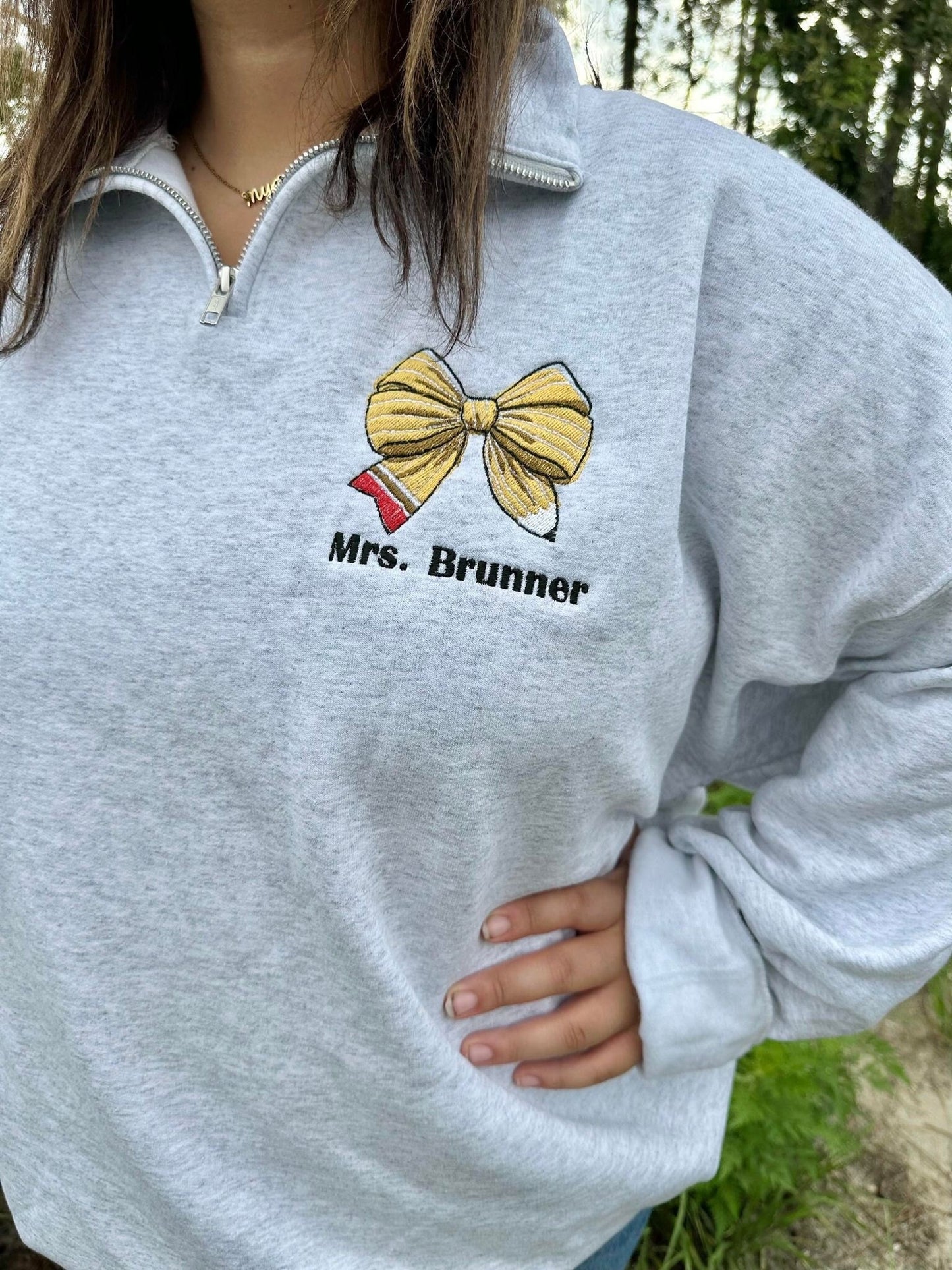 Pencil Bow with Personalized Teacher Name on Quarter Zip Sweater - On model